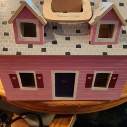 Melissa & Doug Fold & Go Doll House