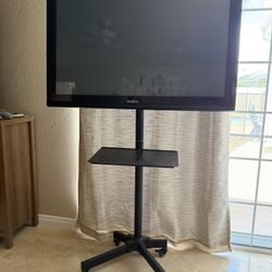 42” Insignia TV w/ 5ft Rolling Stand