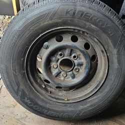 Rims and tires from 1997 Toyota tacoma pickup truck