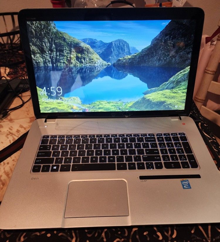 Silver HP Intel  Touch Screen and Pin Laptop Computer 