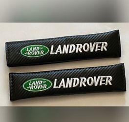 2 Land rover seat belt shoulder pads universal fit projector door lights Etc sold separately. SHIPPING AVAIL.