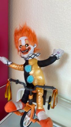 Creepy Clown Figure on Bicycle Toy Halloween