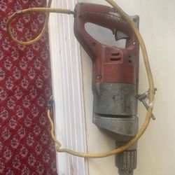 Construction Milwaukee Drill. 