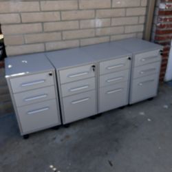 Office Filing Cabinets. In Excellent Condition. Keys Included. They Have Wheels. $35 Each OBO. Ten Available. 