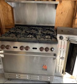 Wolf 6 burner gas stove and oven with top oven
