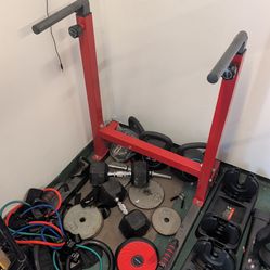 Adjustable dip bar/pushup station