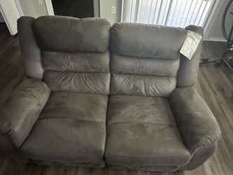 Ashley Signature Design dual reclining loveseat, dark gray faux suede