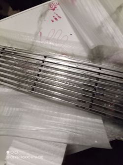 Grille with hardware