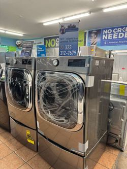 🌟SALE OF THE DAY🌟 LG 5.2 Cu Ft Mega Capacity Front Load Washer with Pedestal Washer and LG 9.0 Cu Ft Mega Capacity Gas Dryer