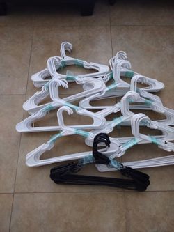 100 Pk  Plastic   Hangers. $8