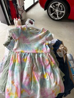 A case of 35 little girl dresses