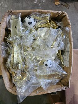 1000's of sports trophies football soccer racing bowling selling all in bulk NEW
