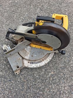 DeWalt DW705 12in Miter Chop Saw .Looks Like Shit Works Excellent. Four pick up fremont sea. No low ball offers please. No trades