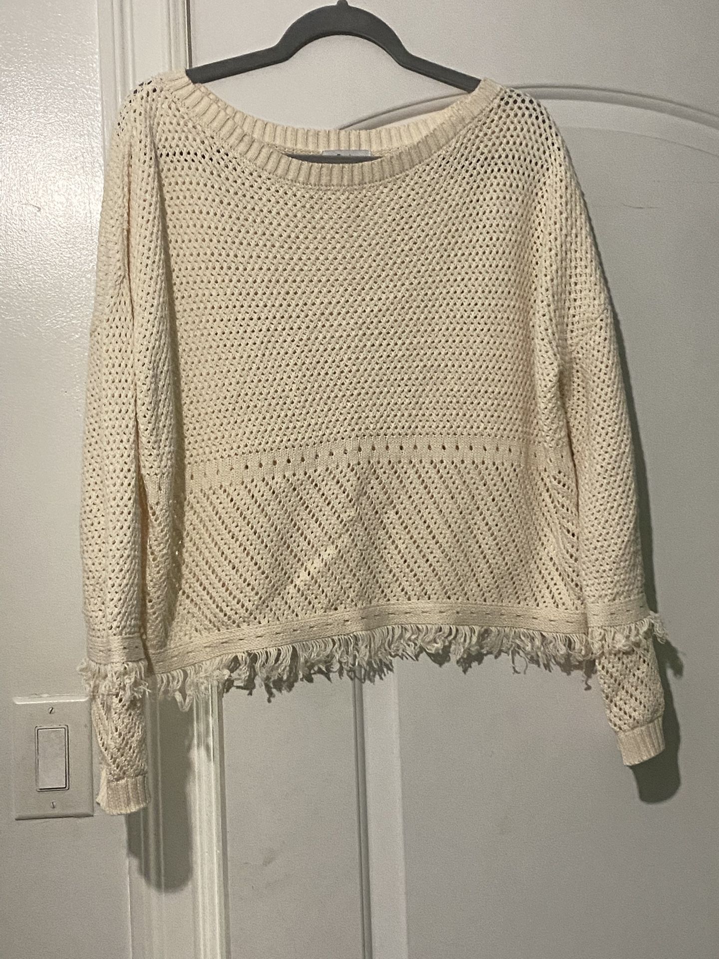 Cream Fate knit sweater with tassels on arms and waist detail size medium