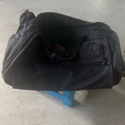 TUMI rolling Carryon Luggage