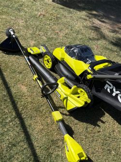 RYOBI 40V Kit: 20-inch push lawn mower, string trimmer, and leaf blower; includes (1) 6 Ah battery and (1) charger.