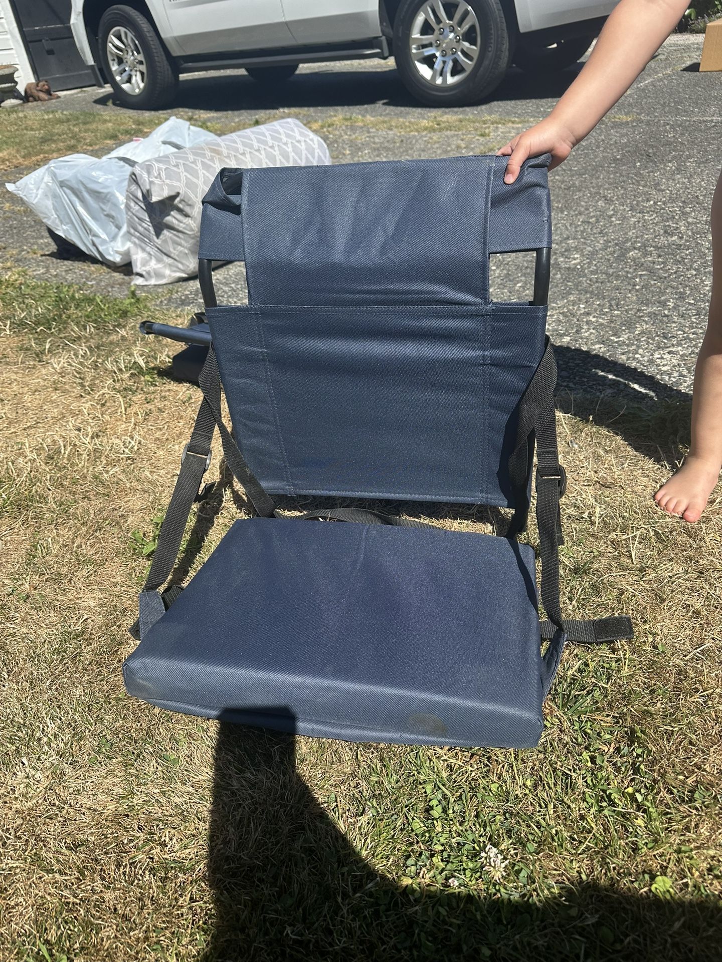 2 stadium/bleacher chairs