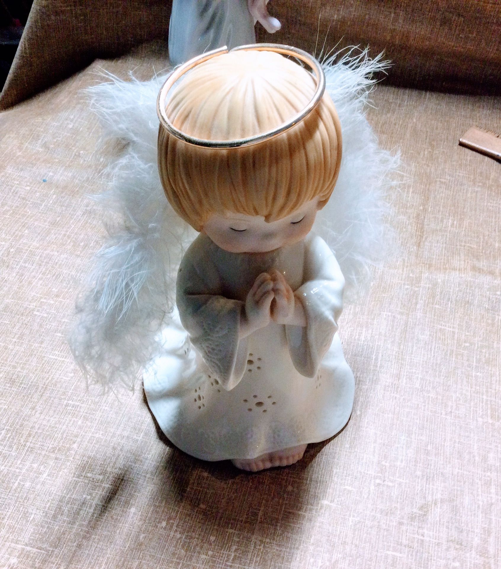 Fiber Optic Wings Light Up on this praying Angel. 8” tall