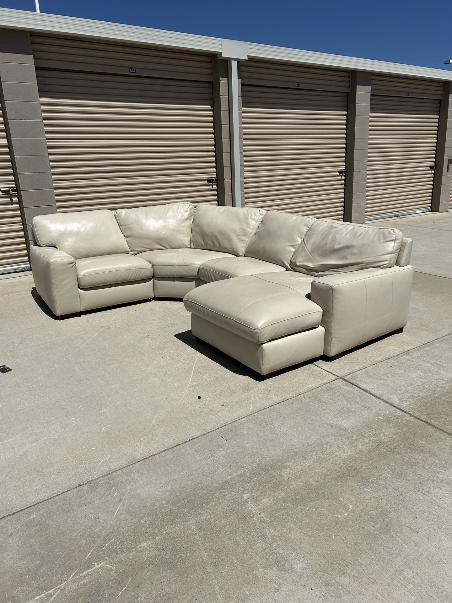 Beautiful White Leather Sectional Couch (Delivery Available)