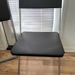 Black folding Chairs X2