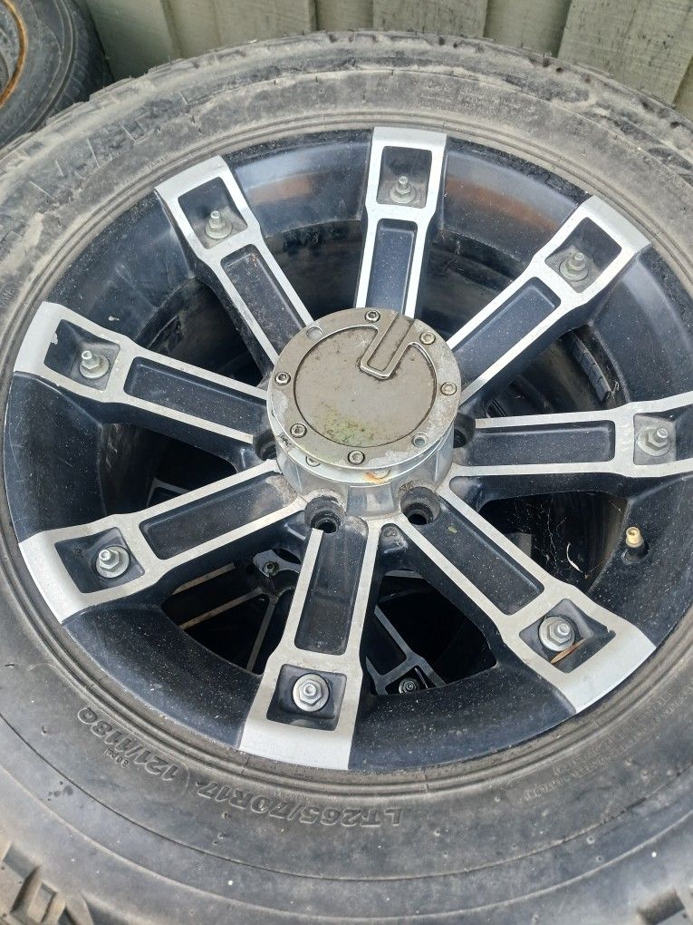 Nice Set Of 6 Lug Rims Along With A Nice Set Of Off Road Tires