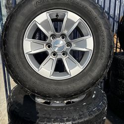 SET OF FOUR 17” CHEVY GMC WHEELS AND TIRES