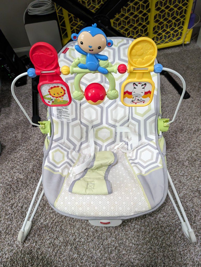 Fisher-Price Baby's Bouncer Geo Meadow, Portable Infant Soothing and Play seat with Toys and Vibrations


