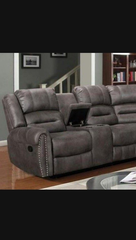 Kenedy Brown reclining Sectional Sofa