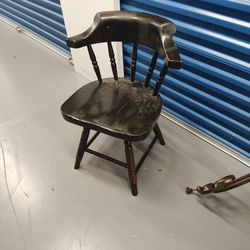 brown wooden swivel chair