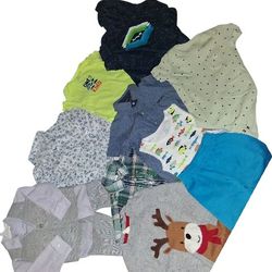 Colorful set of kids clothing featuring various designs and patterns. Includes shirts, shorts, and a sweater with a reindeer design. Excellent Conditi