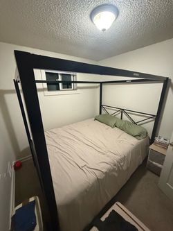 Canopy bed frame and queen size bed