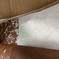 2 NEW (OPEN BOX) LEATHER MOSTLY BROWN AND WHITE-COW CHAIRS WITH BELIEVE CHROME FRAMES-NEVER TRIED TO PUT TOGETHER BUT EASY TO DO-THESE 2 RUN $800+ NEW