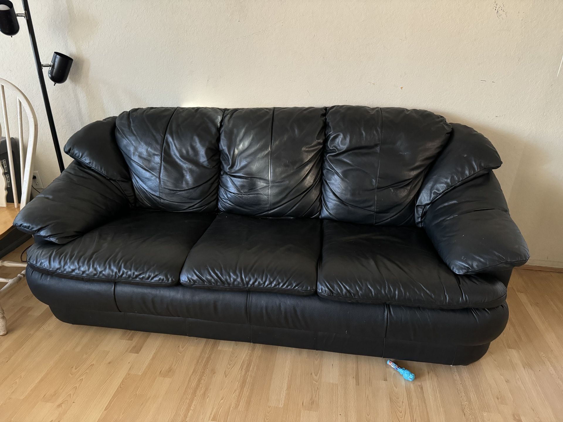 Two Black Leather Couches