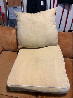 Outdoor yellow seat cushion and back pillow