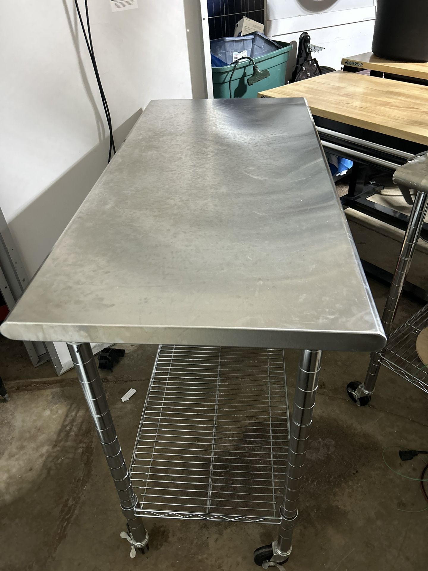 Stainless steel table work utility office 49 x 24 x 39 1/2 I have 2 a available