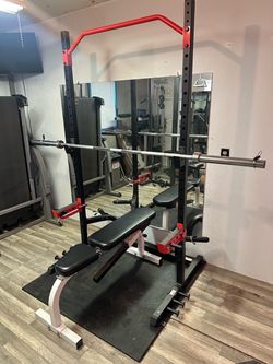 Weight bench squat rack combo with weight plates