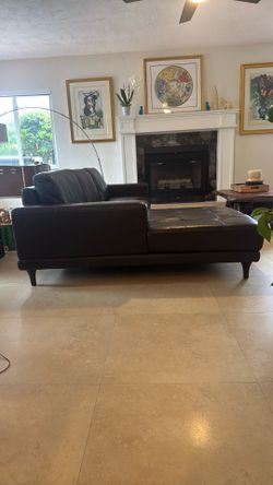Leather brown sofa  9x 5 1/2