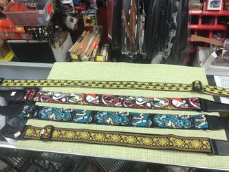 GUITAR STRAPS FOR $21.00. WITH DIFFERENT DESIGNS AND ADJUSTABLE TO ANY FIT.