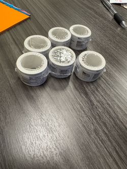 Sealed forever stamps in coil