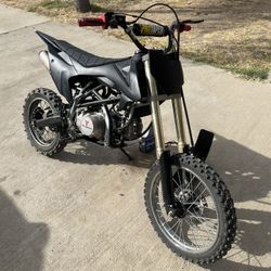 140cc dirtbike big wheel (only trade for z125 or grom)