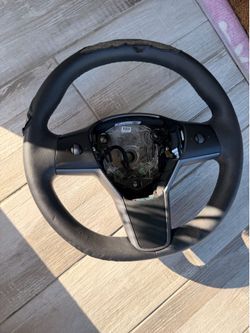 OEM Tesla Steering Wheel from a 2023 Model Y