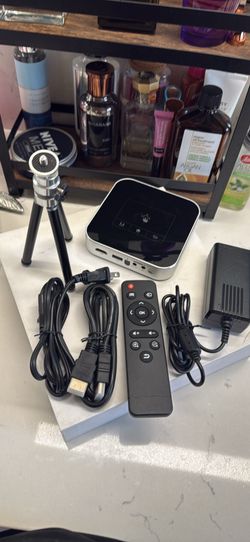 A portable mini-projector with a built-in rechargeable