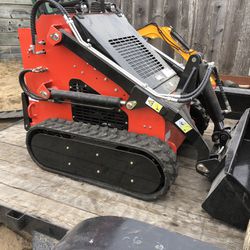New Mini Skid Steer On Tracks 42 Inches Wide  Grapple, bucket and forks are available 