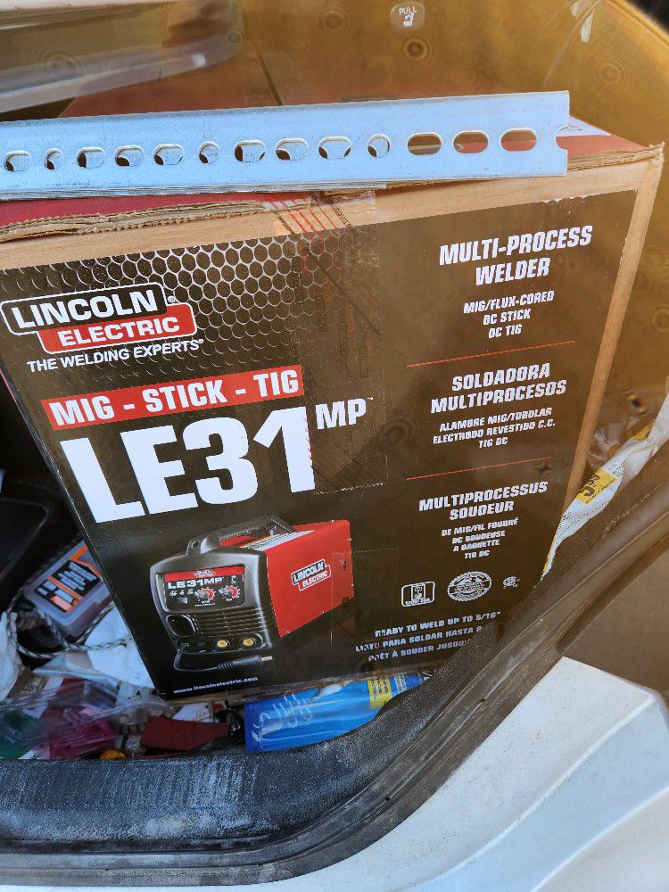 Lincoln Le 31 MIG TIG STICK WELDER  New Never Out Of Box