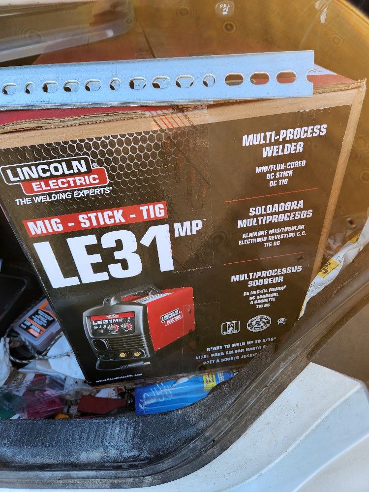 Lincoln Le 31 MIG TIG STICK WELDER New Never Out Of Box