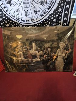 Poater of James Dean, Marilyn Monroe, Elvis Presley, and Humphrey Bogart.