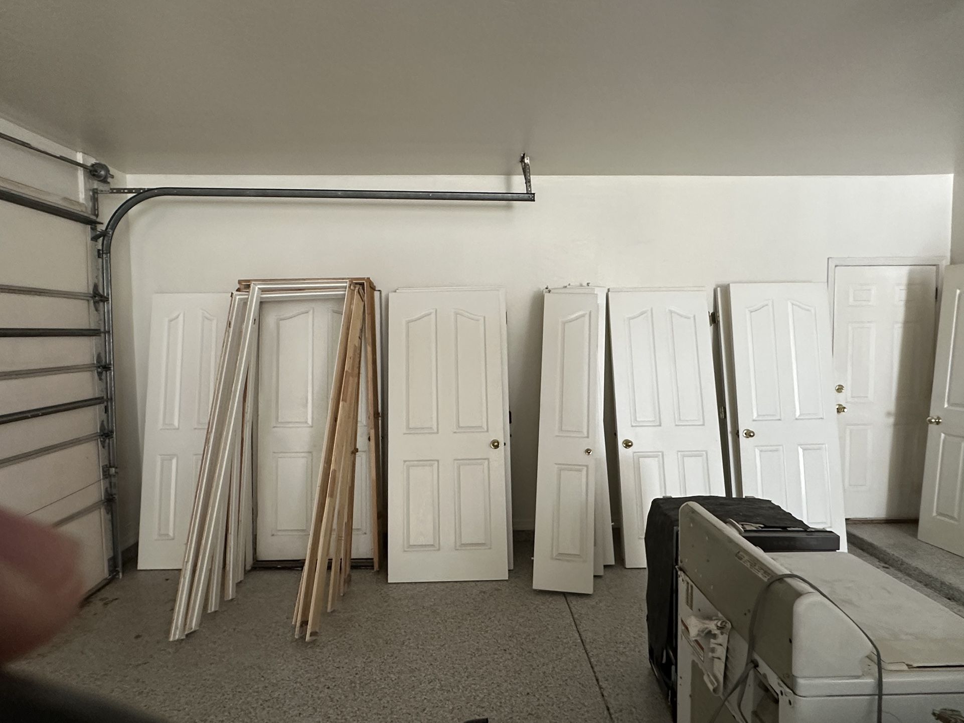 23 Interior Doors , Closest Doors,  Two Steel Garage Doors 