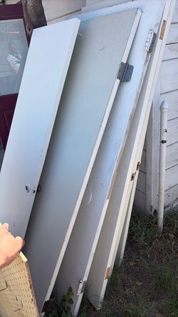 Free smooth panel doors  7 of them.