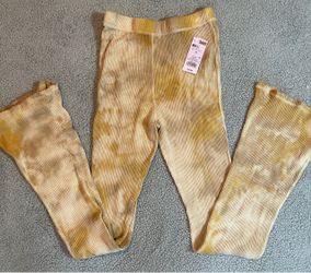 Yellow tie-dye ribbed flare pants #flares #tie-dye