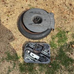 Spare Tire, Trunk Mount With Air Fill Hose And jack/tools For 2009 Mini Cooper.